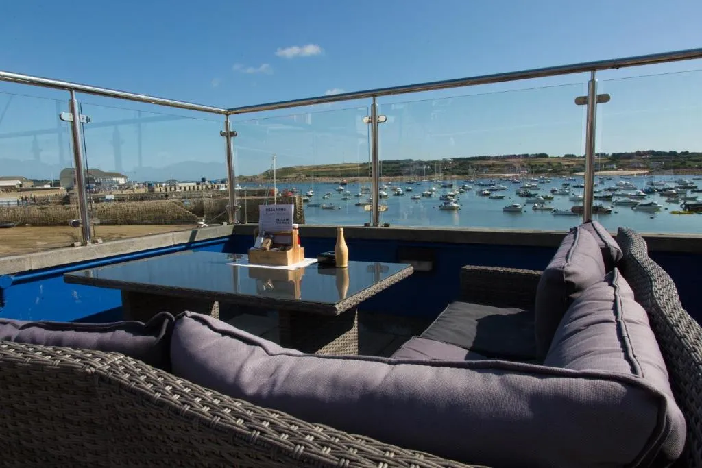 Serene place to sit and watch the view of St Marys, Isle of Scilly when you stay in a pub at the Atlantic