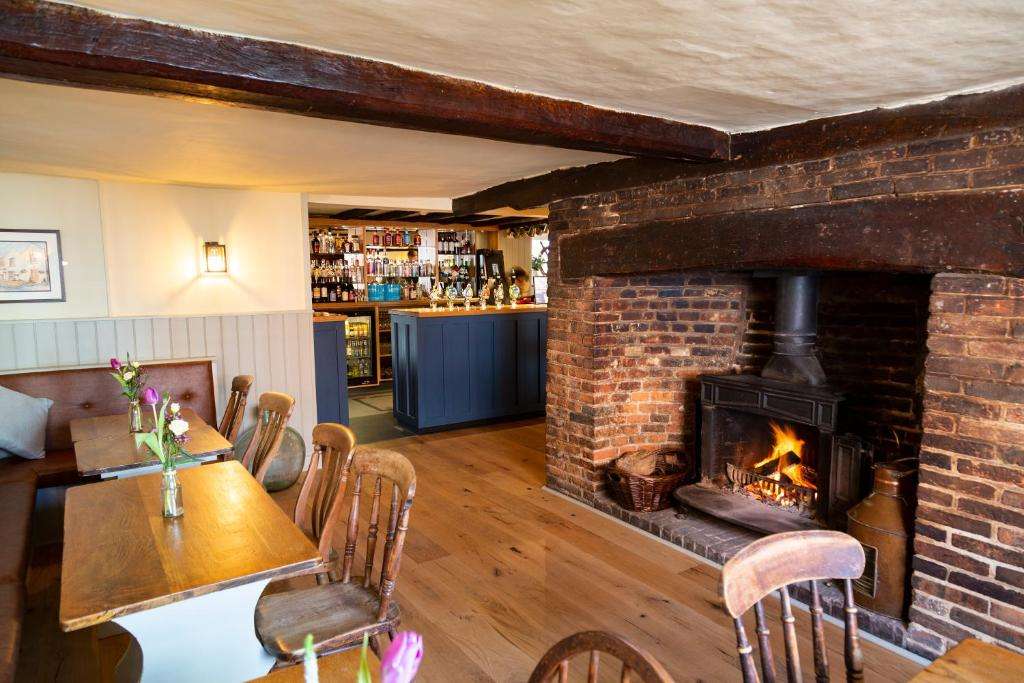 cross keys cosy pub fireplace and dining room