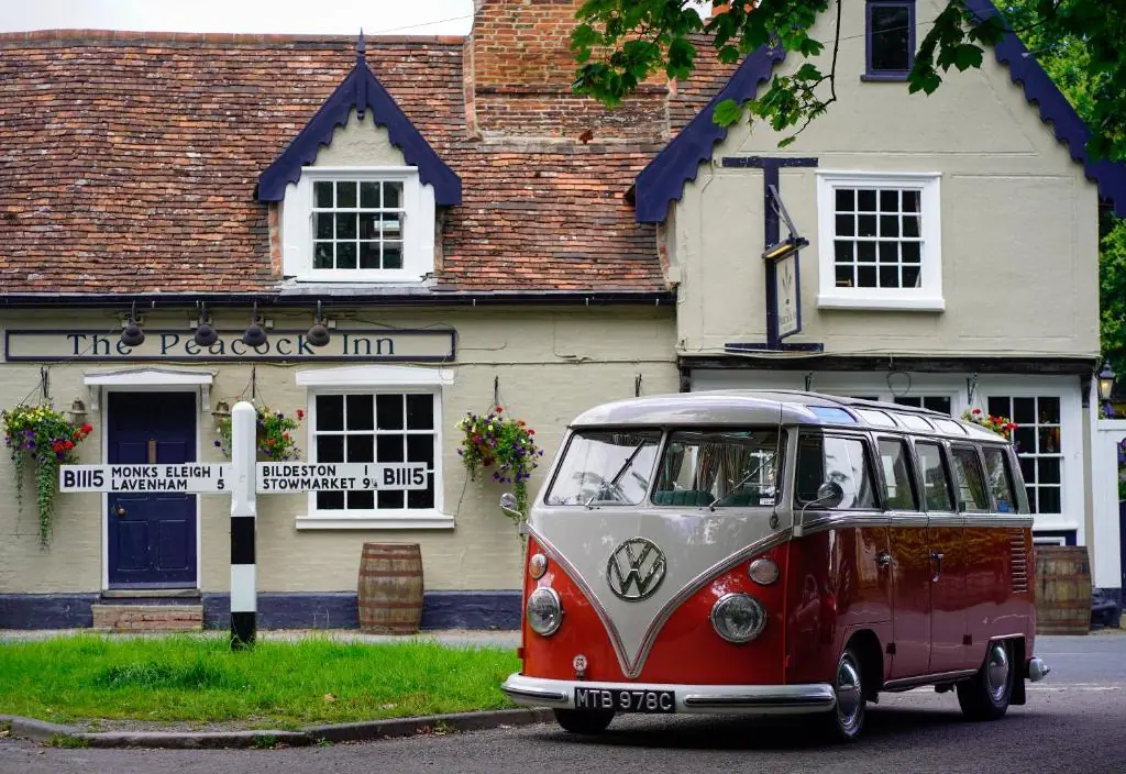 The Peacock Inn, Suffolk with a retro camper van sat out the front