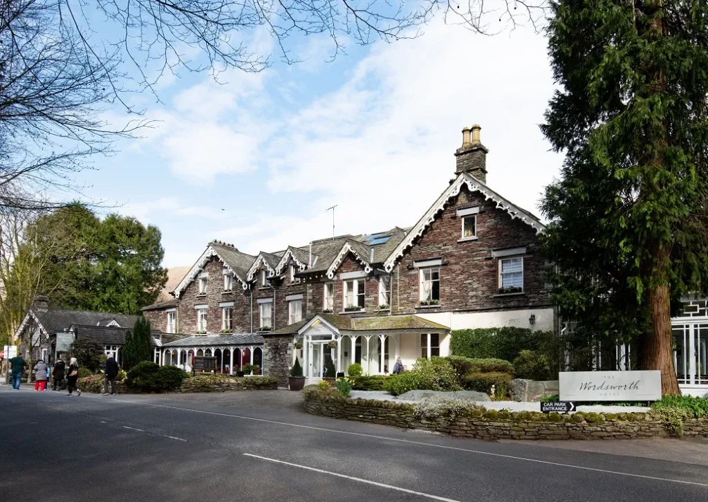 The front of the Wordsworth Hotel  - a large building with neat shrubbery outside